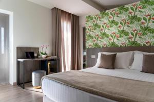 Postel nebo postele na pokoji v ubytování Civico25 Suite Hotel