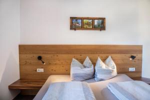 Postel nebo postele na pokoji v ubytování Chalet Ebnerhof