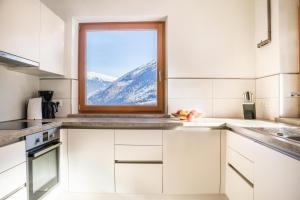 Kuchyň nebo kuchyňský kout v ubytování Chalet Ebnerhof