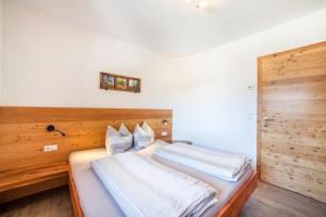 Postel nebo postele na pokoji v ubytování Chalet Ebnerhof