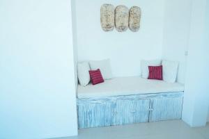 Ein Bett oder Betten in einem Zimmer der Unterkunft Rapture Surfcamps Green Bowl