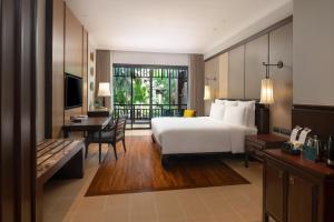 Un pat sau paturi într-o cameră la InterContinental Pattaya Resort by IHG