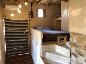 Maison d'hôte ''J'' tesisinde bir odada yatak veya yataklar