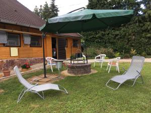 Vonkajšia záhrada v ubytovaní Aktiv pihenés apartman