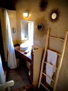 Ванная комната в Maison d'hôte ''J''