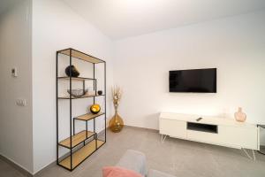 Telewizja i/lub zestaw kina domowego w obiekcie Villa Camilla