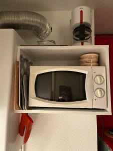 Kuchyň nebo kuchyňský kout v ubytování Appt pied des pistes, terrasse et parking couvert + 19 fotografií