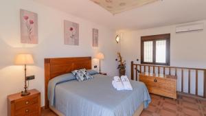 Posteľ alebo postele v izbe v ubytovaní Casa Olivia Cómpeta by Ruralidays + 20 fotografií