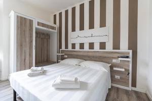 Postel nebo postele na pokoji v ubytování Albergo Centrale