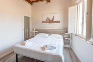 Postel nebo postele na pokoji v ubytování Albergo Centrale