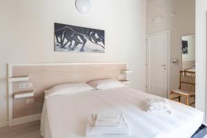 Postel nebo postele na pokoji v ubytování Albergo Centrale
