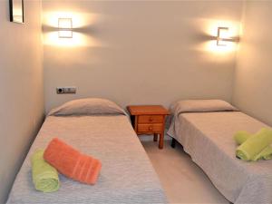 Posteľ alebo postele v izbe v ubytovaní Apartment les oliveres