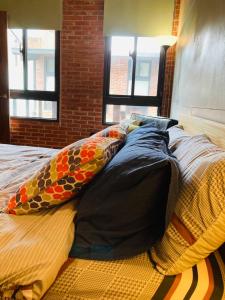 Postel nebo postele na pokoji v ubytování Sinnan12 Homestay桃園市民宿059號