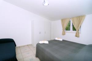 A bed or beds in a room at Brezza dell'Alento Még 20 kép