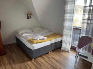 Łóżko lub łóżka w pokoju w obiekcie Agropajda
