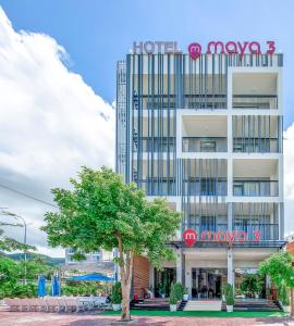 a building with a sign that reads hotel akoya at Maya Hotel 3 in Con Dao