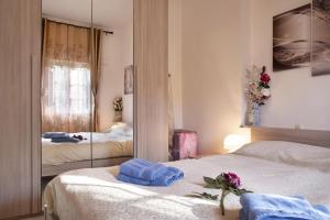 Una cama o camas en una habitación de AL CIOS lago Maggiore