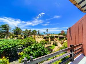 a view from the balcony of a resort at Aimberê Eco Resort Hotel in Coqueiro