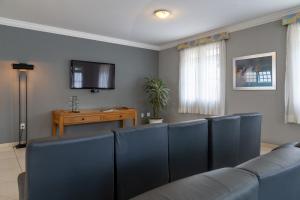 TV in/ali zabaviščno središče v nastanitvi Hotel Solaris