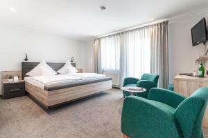 Postel nebo postele na pokoji v ubytování Hotel Die Post Meerfeld + 26 fotografií