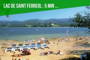 a beach with a bunch of people on it at LOFT DU GET in Revel