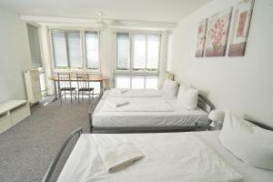 Una cama o camas en una habitación de BNB Potsdamer Platz Rooms & Apartments