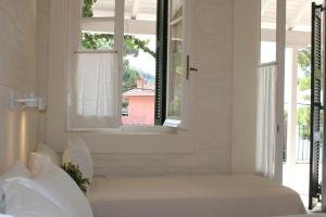 Voodi või voodid majutusasutuse Zefiros Traditional Hotel toas