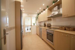 Kuchyňa alebo kuchynka v ubytovaní Miramar del Sol - Apartamento de 2 Dormitorios