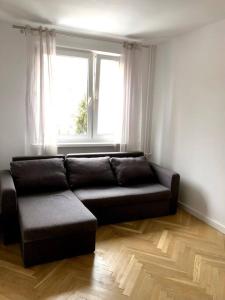 A seating area at Apartament 9 min od morza Gdańsk “Przy morzu”