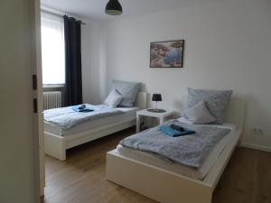 Postel nebo postele na pokoji v ubytování Don Quijote Ferienwohnung