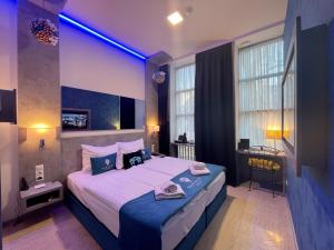 Postel nebo postele na pokoji v ubytování Smart Hotel Budapest