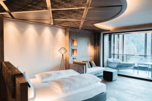 Posteľ alebo postele v izbe v ubytovaní Leitgam luxury Hotel for two