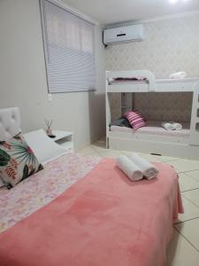 Cama ou camas em um quarto em Divino Lugar