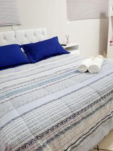 Cama ou camas em um quarto em Divino Lugar