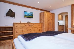 Postel nebo postele na pokoji v ubytování Gästehaus Zum Wurm