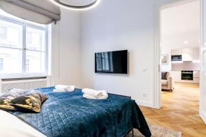 Postel nebo postele na pokoji v ubytování Luxury apartments in the city centre