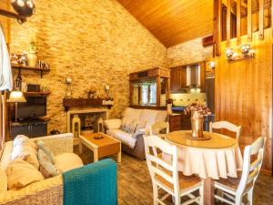 a living room with a couch and a table at Bancalillo redondo in Dúrcal