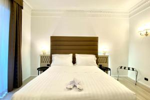 Postel nebo postele na pokoji v ubytování BB Hotels Smarthotel Bailey's