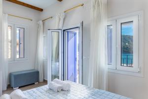 Posteľ alebo postele v izbe v ubytovaní SUN NEST HOUSE