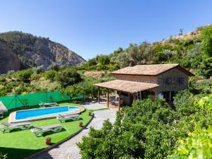 una imagen de una villa con piscina en Cortijo Fuente del Lino, en Cónchar