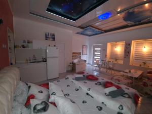 Postel nebo postele na pokoji v ubytování Apartman -HARMONY-