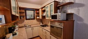 Kuchyň nebo kuchyňský kout v ubytování Apartman Luka Zadar