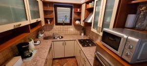 Kuchyň nebo kuchyňský kout v ubytování Apartman Luka Zadar