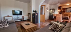 TV a/nebo společenská místnost v ubytování Apartman Luka Zadar