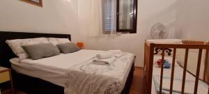 Postel nebo postele na pokoji v ubytování Apartman Luka Zadar
