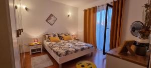 Postel nebo postele na pokoji v ubytování Apartman Luka Zadar