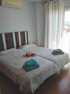 Posteľ alebo postele v izbe v ubytovaní Apartament Catalunya, céntrico y con Parking