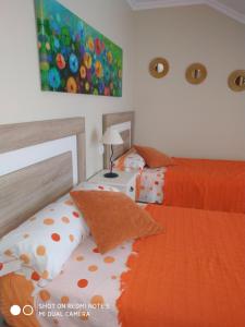 A bed or beds in a room at Anamari's