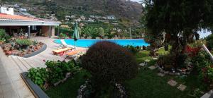 Bassein majutusasutuses Arcos Grand Suites with pool või selle lähedal
