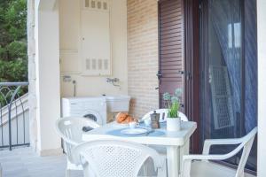 A balcony or terrace at Homiday - Residence Micaene